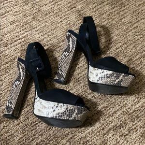 Schultz animal print suede platform sandals.